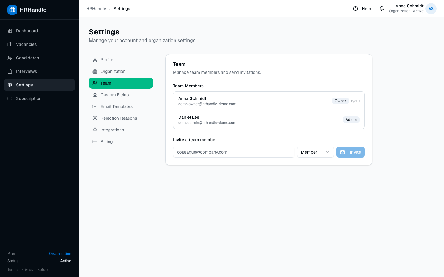 The Team settings page with two members listed and an invite form below